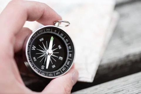 Compass and map. Travel concept Stock Photos