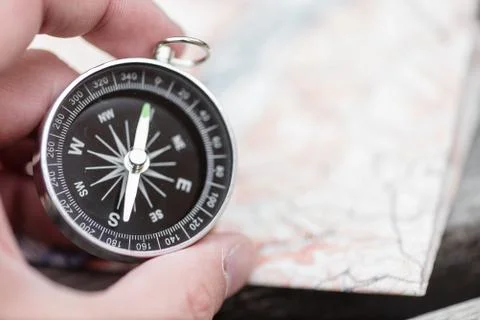 Compass and map. Travel concept Stock Photos