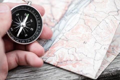 Compass and map. Travel concept Stock Photos