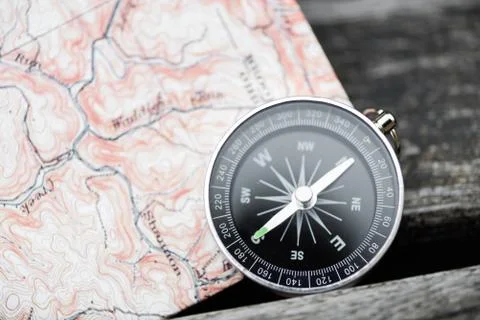 Compass and map. Travel concept Stock Photos