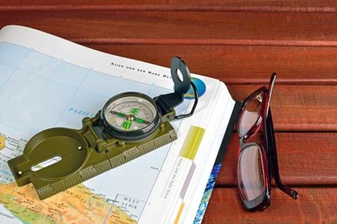 Compass and maps Stock Photos