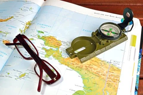 Compass and maps Stock Photos