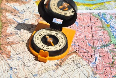 Compass and  maps. Stock Photos