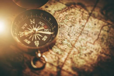 Compass and Paper Map Navigation Tools Closeup Stock Photos