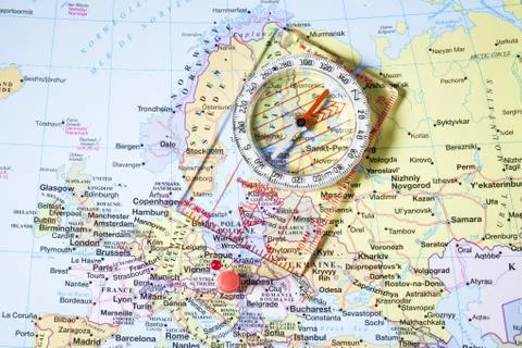 Compass and pin on map Stock Photos