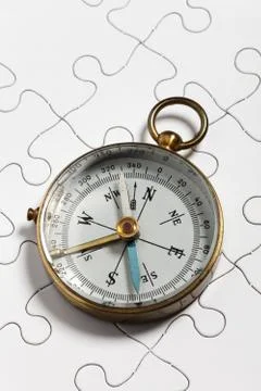 Compass and Puzzle 스톡 사진