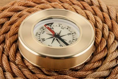 Compass and rope Stock Photos
