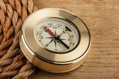 Compass and rope Stock Photos