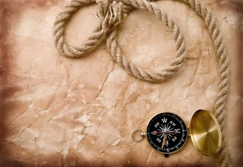 Compass and rope Stock-Fotos
