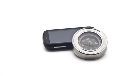 Compass and smartphone Stock Photos