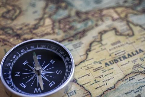 Compass on the background, old world map, vintage style, geo-navigation con.. Stock Photos