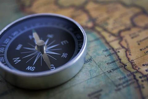 Compass on the background, old world map, vintage style, geo-navigation con.. Stock Photos