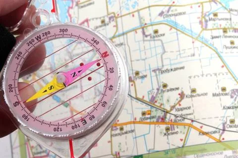 The compass on the background Stock Photos