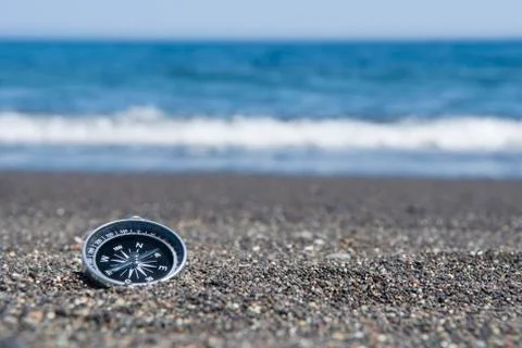 Compass on the Beach Stock Photos
