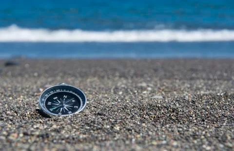 Compass on the Beach Stock Photos