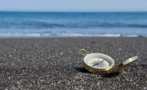 Compass on the Beach Stock Photos