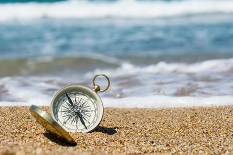 Compass on the beach Stock Photos