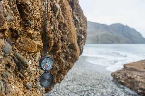Compass on the beach Stock Photos