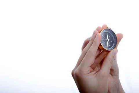 Compass in child's hand Fotos Stock