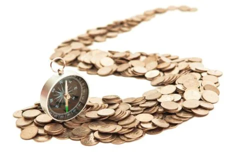 Compass on coins Fotos Stock