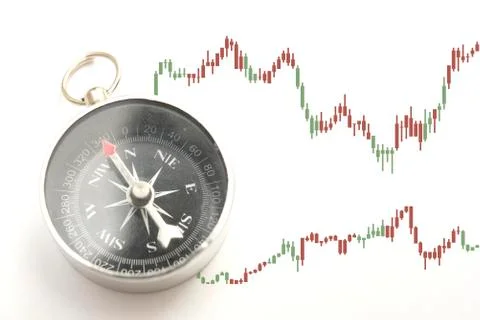 Compass double exposure with forex graph Stock Photos