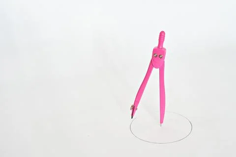 A compass as a drawing tool for drawing circles or arcs. It is also used to a Stock Photos