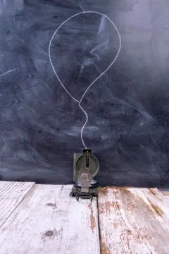 Compass in front of a blackboard Stock Photos
