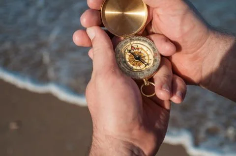 Compass in hand 스톡 사진