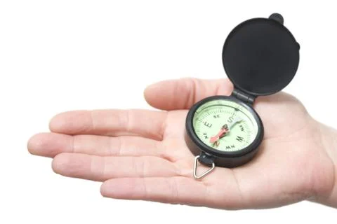 Compass on a hand Stock Photos