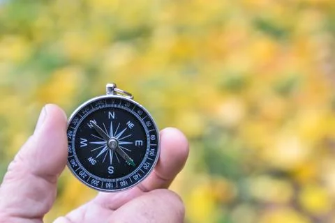 Compass in hand. Stock-Fotos