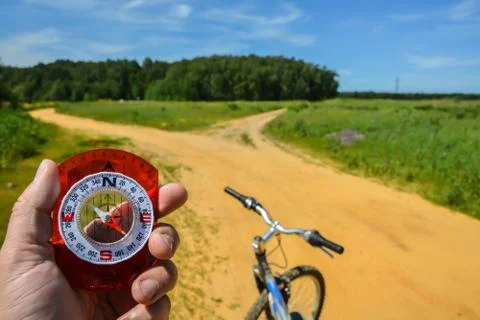 Compass in hand. Stock Photos