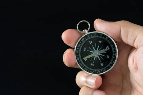Compass in hand Stock Photos