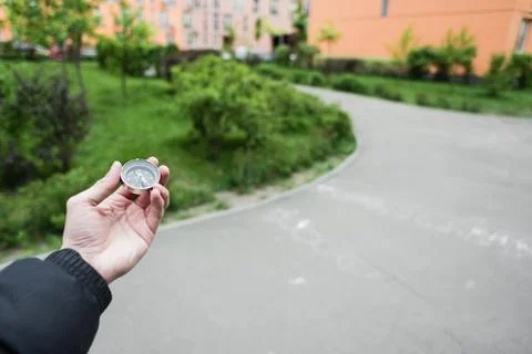 Compass in hand Stock Photos