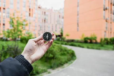 Compass in hand Stock Photos