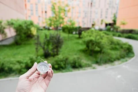 Compass in hand Stock Photos
