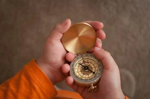 Compass in hands Foto stock