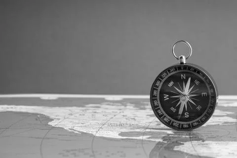 Compass isolated on world map background 库存照片