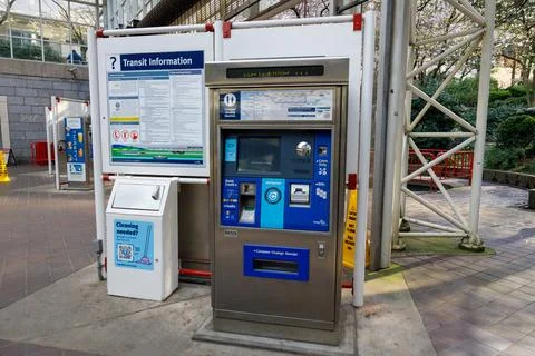 Compass machine and Transit Information board at Burrard Station Stock Photos