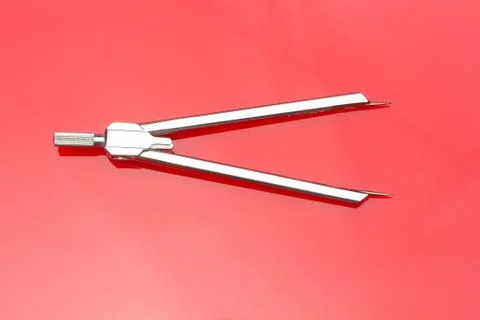Compass to make circles and take measurements on the planes Stock Photos