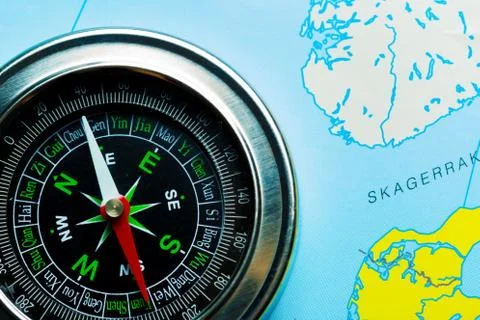 Compass on map background travel Stock Photos