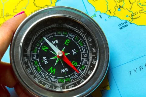 Compass on map background travel Stock Photos