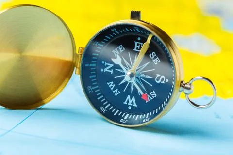 Compass on map background travel Stock Photos