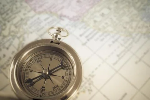 Compass on map background, use for travel concept Stock-Fotos