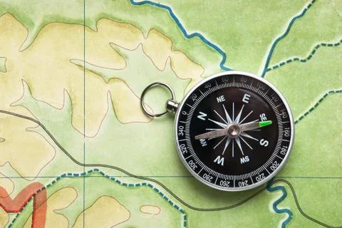 Compass on a map Stock Photos