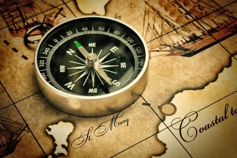 Compass on map Stock Photos