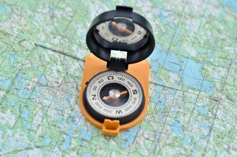 Compass on the map. Stock Photos