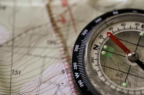 Compass on a Map Stock Photos