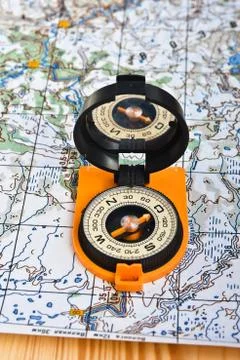 Compass on the map. Stock Photos
