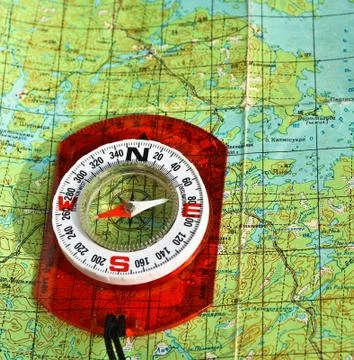 Compass on the map. Stock Photos