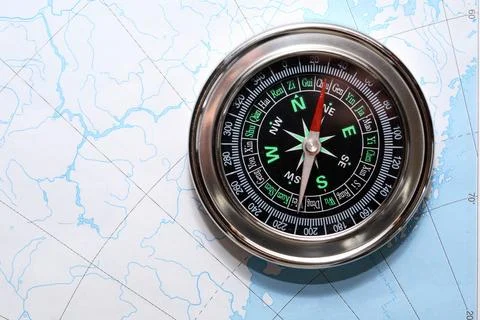 Compass On Map Фото